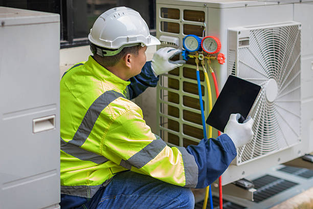 Professional Air Duct Cleaning technician working in Hubbard, OR